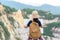 Children asian girl holding maps and travel backpacks standing in the mountain.