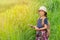 Children asian girl holding maps and travel backpacks walking in the green forest.