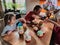 Children baking cupcakes, preparing ingredients, decorating cookies