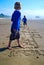 Children on Beach playing Hopscotch