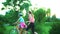 Children in bicycle helmet go on hill walk bike