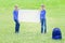 Children with blank white placard board outdoors