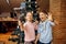 Children bloggers makes selfie at christmas tree