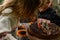 Children blow out candles on a name cake, a delicious dessert for a birthday, bright and colorful candles