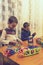 Children Boys playing with construction set on the floor.Educational games for kids. Boys playing whit blocks