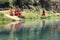 Children Buddhist monks and their reflection in the river. Children Buddhist monks and their reflection in the river.