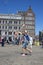 Children catch soap bubbles in the central Dam Square in Amsterdam