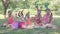 Children celebrate their birthday in the park. Birthday party.