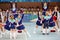 Children cheerleaders team perform stunts