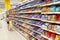 Children choose sweets in confectionery department of supermarket