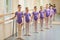 Children at classical ballet lesson.