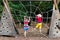 Children climb on school yard playground