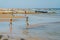 Children at the coastline from Morondava during low tide