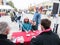 Children come to Food Day table at Corvallis Farmers Market