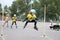 Children competition in roller sport.A girl on roller skates jumping over a sports