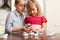 Children are considering a magnifying glass stones