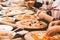 Children cook pizza. Master class from the chef in a restaurant, Close-up of children`s hands roll out the dough