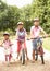 Children In Countryside Wearing Safety Helmets