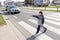 Children crossing street with officer