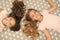 Children curly hairstyle relaxing. Keep hair curly even next morning. Girls children with long hair lay on bed top view