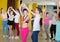 Children dancing rock-and-roll in pairs in choreography class wi