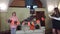 Children decorate their home with Happy Halloween inscription for celebrate Halloween at home