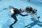 Children discover Scuba Diving on a swimming pool