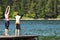 Children diving into lake