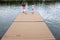 Children On Dock Throwing Rocks