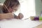 Children draw in home, Boy studying drawing at school