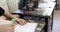 Children draw at their desks in an art school, shallow focus