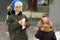 Children eating street food,winter portrait