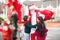 Children Embracing Santa Claus