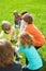 Children enjoy tug-of-war in summer camps