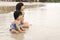 Children enjoy waves on beach