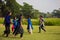 Children enjoying blind manâ€™s bluff game in the leisure time on school playground.