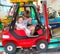 Children enjoying a ride in an amusement park