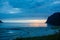 Children, enjoying sunset on Ersfjord Beach on Senja island, beautiful landscape view over the mountains