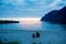 Children, enjoying sunset on Ersfjord Beach on Senja island, beautiful landscape view over the mountains