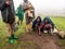 Children in Ethiopia playing mancala game, on a foggy day