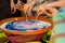 Children experiment with the colors in the dishes