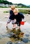 Children Explore Sea life in Tide Pools