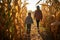 Children exploring corn maze in the fall day. Siblings two girls playing in corn maze. Kids on pathway in corn field. Popular