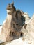 Children exploring the fairy chimney houses at Cappadocia, Turkey