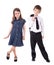 Children fashion concept - little boy in business suit and girl