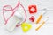 Children feeding with breastmilk or infant formula powdered baby milk and toys on wooden background top view