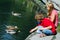 Children feeding ducks