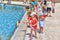 Children float boats in the fountain Luxembourg Palace