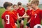 Children Football Soccer Team Standing Together in a Circle