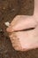 Children foots on beach sand